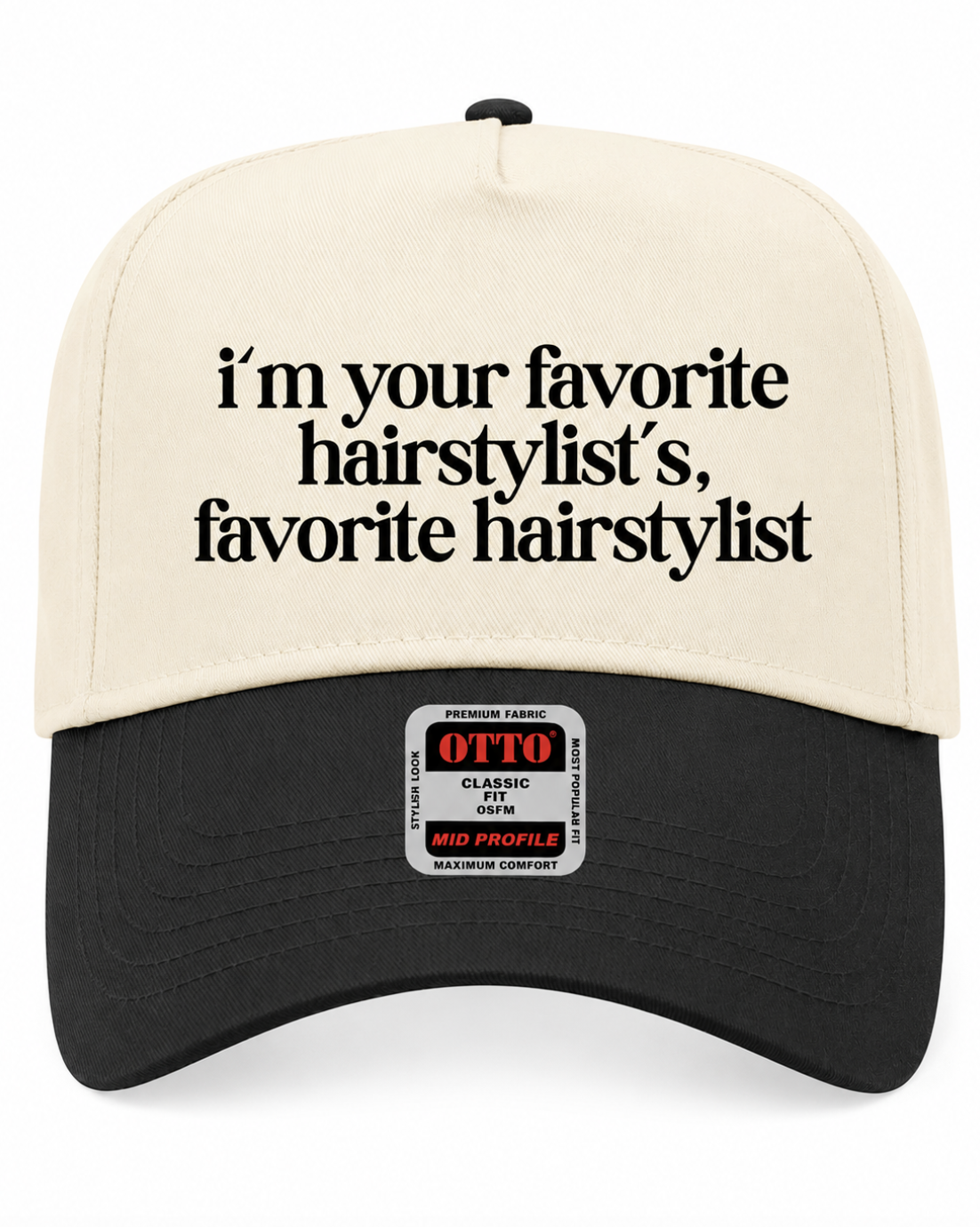 A structured baseball cap with a cream-colored crown and a black curved brim. The cream crown features the black printed text 'i'm your favorite hairstylist's, favorite hairstylist' on the front.