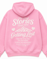 Pink hoodie with white text on the back on a white background