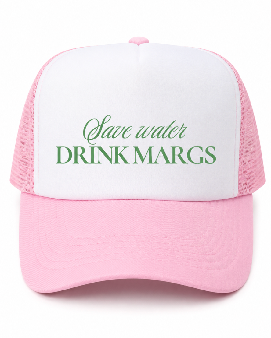 A pink and white trucker hat with the text 'Save water DRINK MARGS' printed on the front, set against a plain white background.