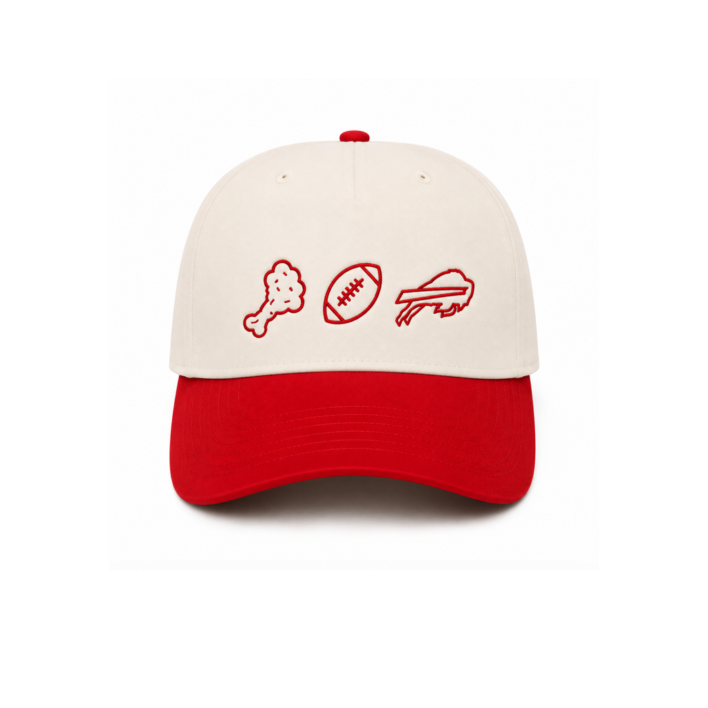 A two-tone baseball cap with an off-white crown and a red curved brim, featuring red embroidered icons of a chicken leg, a football, and a chicken wing on the front.