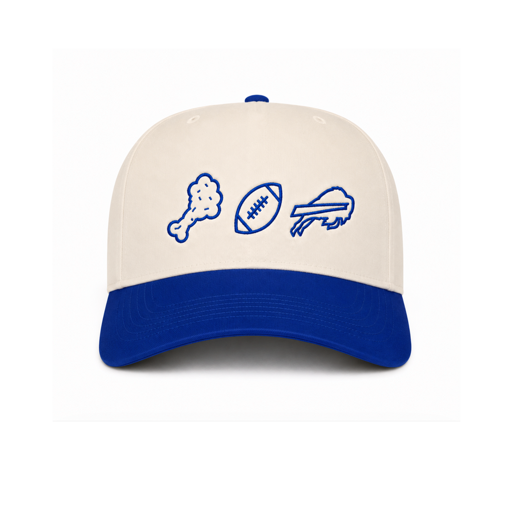 A structured baseball cap with an off-white crown and a royal blue brim, featuring three blue embroidered sports icons on the front: a chicken leg, a football, and a bills logo